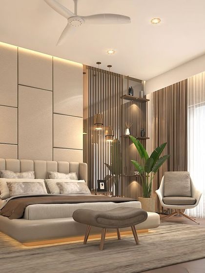 This bedroom design focuses on creating a restful environment through a balanced composition. The upholstered headboard, floating bed with under-lighting, and carefully selected pendant lights come together to form a harmonious and luxurious personal space.