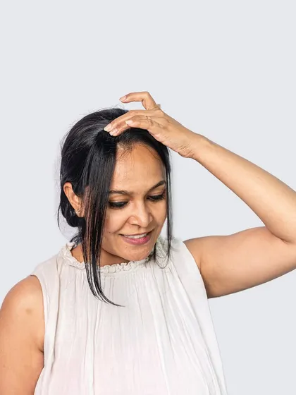 See how simple it is to place a Face Framer extension. It clips in easily near your parting to give you that extra bit of volume and coverage at the front, blending in perfectly.