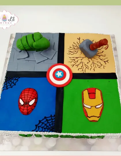 A superhero fan's dream cake, divided into four quadrants to represent Hulk, Thor, Spider-Man, and Iron Man.