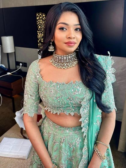 A portrait of the happy bride-to-be. The clean, glowing makeup lets her joyful expression be the main focus.