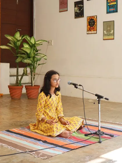 A young vocalist performs at our Platform Performances event for young artists.