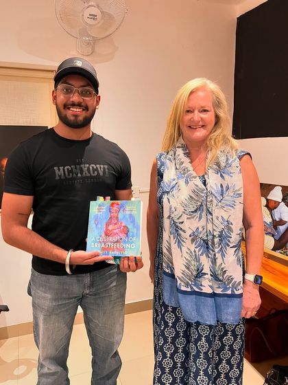 The author poses with an attendee at the book discussion event. Our studio events are a great place for direct interaction between artists and their audience.