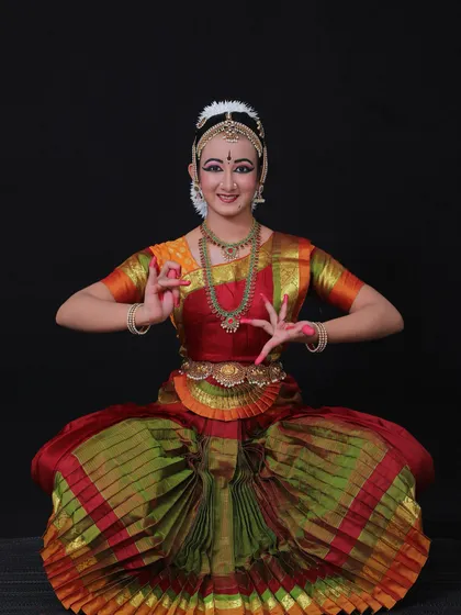 Anandi looked like a little goddess in this attire for her Arangetram. She performed the Daru Varnam 'Maathe' on the divine Shakti, and this photo captures that powerful essence.
