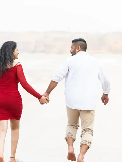 Walking away hand-in-hand. This shot creates a sense of a shared journey and a story that is just beginning.