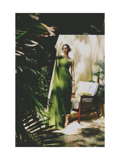 For the AVEKA 'Love Letter' campaign, this shot uses natural light and shadows to create a serene, romantic mood. The framing with tropical leaves adds a sense of intimacy and escape.
