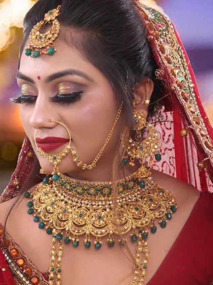 A close-up showcasing the details of a glamorous bridal look. Notice the dramatic winged eyeliner, the shimmer on the lids, and the perfectly blended skin, all essential for a photo-ready finish.