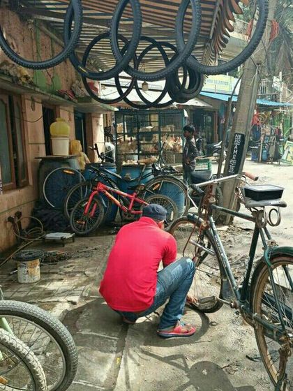 A local bicycle repair shop, the kind of place that keeps a community moving. We celebrate and collaborate with these local experts, who often serve as mentors in our workshops.