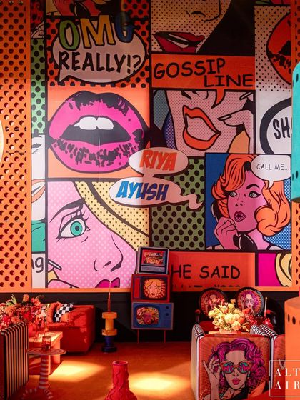 A full view of the Pop Art room, featuring a custom comic book wall that tells a story. The space is filled with playful details like retro TV installations and custom-printed furniture, creating a fun, nostalgic, and highly graphic environment.