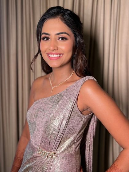 Here you can see how the complete look comes together. The makeup is flawless, the hair is elegant, and she is absolutely glowing. My goal for bridesmaid makeup is to create a cohesive yet individual style for the entire bridal party.