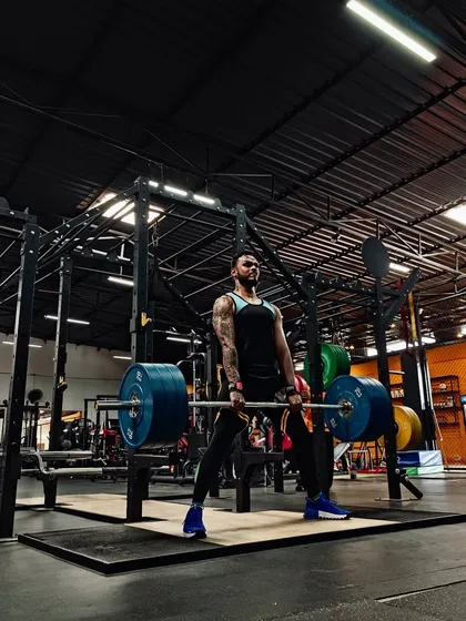 The work doesn't stop with theory. This is me putting principles into practice with a heavy sumo deadlift. I believe that to teach effectively, a coach must also be an athlete, constantly testing and refining the methods they advocate for.