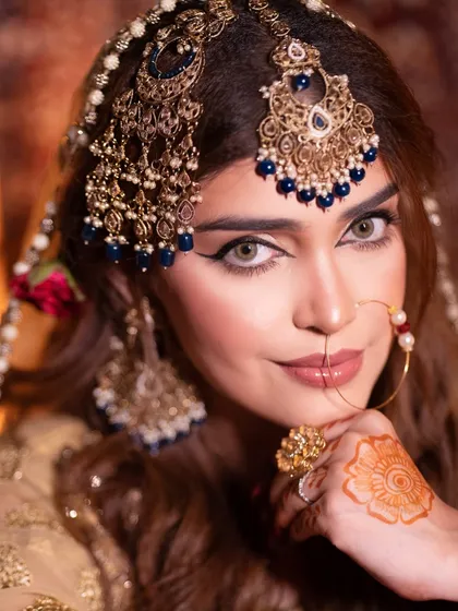A final, confident portrait from our Heeramandi series, showcasing a flawless complexion and striking eye makeup.