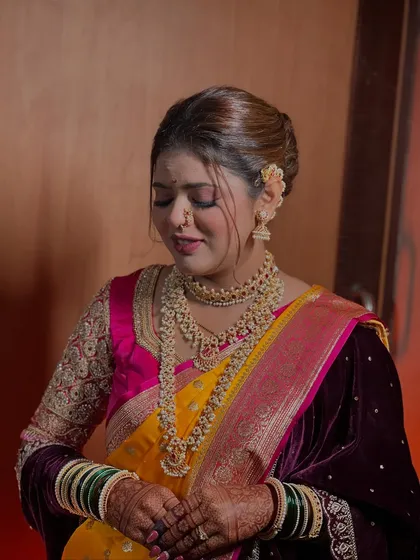 A serene portrait of my Maharashtrian bride, with her eyes closed to show the soft, blended eyeshadow and flawless skin finish.