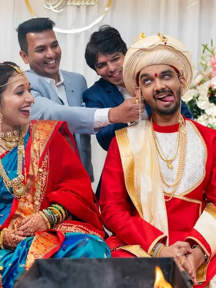 Weddings are about fun too! Capturing the playful teasing between the groom and his friends during the ceremony brings back the laughter and joy of the day.