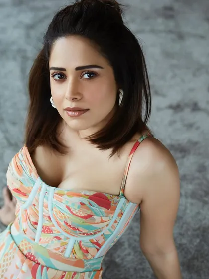 This printed bustier jumpsuit is a versatile piece I chose for Nushrratt Bharuccha's promotions. It's stylish, comfortable, and perfect for a long day of interviews and appearances.