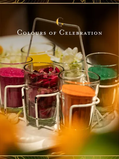 A colourful array of welcome shots, presented in a traditional cutting chai glass holder. Each glass holds a different vibrant flavour, offering a playful and festive start to the event.