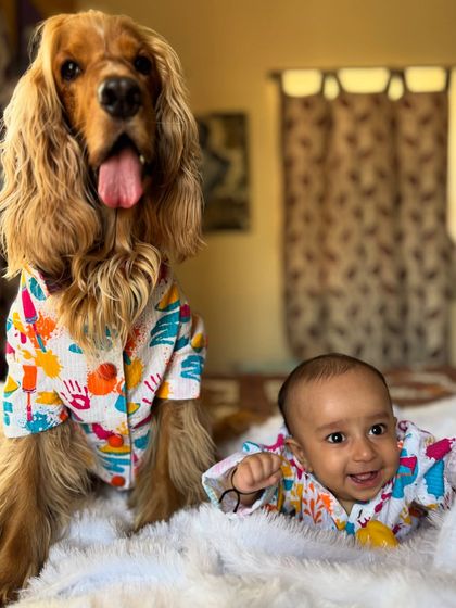 Our first Holi with both boys, twinning in matching colorful kurtas from Wrap in Fur.
