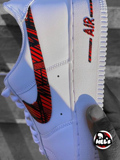 A close-up of the patterned swoosh and midsole detail.