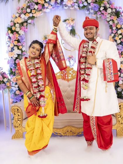 A celebratory moment on a cloud of smoke, this shot is full of energy and joy, marking the beginning of their new life together.