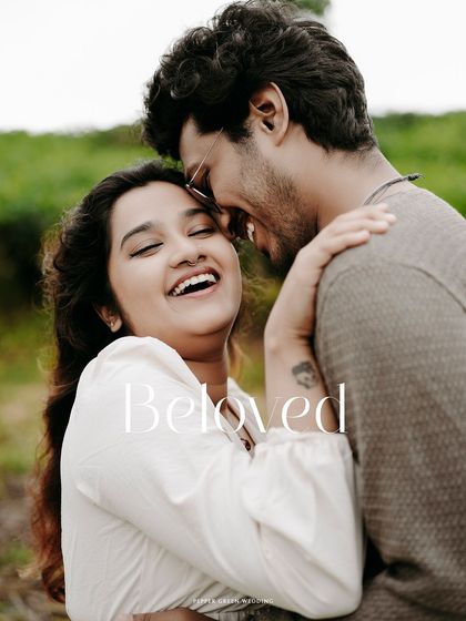 The word "Beloved" overlaid on a joyful, candid photo of Sanchana and Adarsh. This is an example of how I use simple text to enhance the emotion of an image.