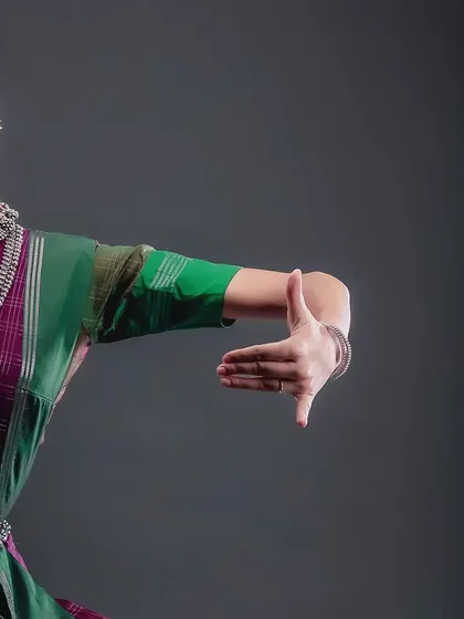 Every hand gesture, or mudra, in Bharatanatyam has a deep meaning. This is a close-up from a studio session, focusing on the subtle yet powerful storytelling aspect of the dance form.