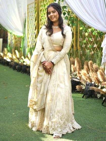 Grace in every step. Our client Jiya looks absolutely stunning in her handcrafted lehenga, bringing elegance and joy together effortlessly for her special occasion.