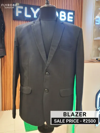 Every man needs a classic black blazer. This versatile piece is a wardrobe essential, perfect for formal events, receptions, or cocktail parties. Get this sharp, pre-loved blazer for an incredible price of only ₹2500.