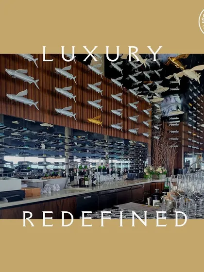 "Luxury Redefined." The stylish bar and decor at our Maldives event, showcasing the sophisticated ambiance we create for international clients.