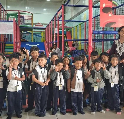 Peace signs and big smiles from this school group. Our team is experienced in managing groups of children, ensuring everyone plays safely and has a memorable time.