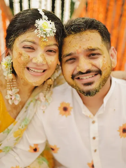 The pure joy of a Haldi ceremony. Even covered in turmeric, their smiles are the brightest. This is what these celebrations are all about.