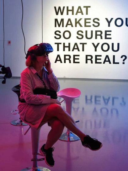A guest contemplates a new reality while using a VR headset at an artful installation. My services can be tailored to fit creative and thought-provoking events as well as high-energy parties.