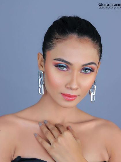 This colorful, abstract eye makeup is a great example of the creative looks explored in my portfolio development module.