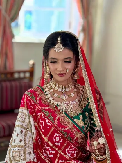 A detailed shot of the makeup, showing the soft eyeshadow blend and the precise application that creates a polished and sophisticated bridal look.