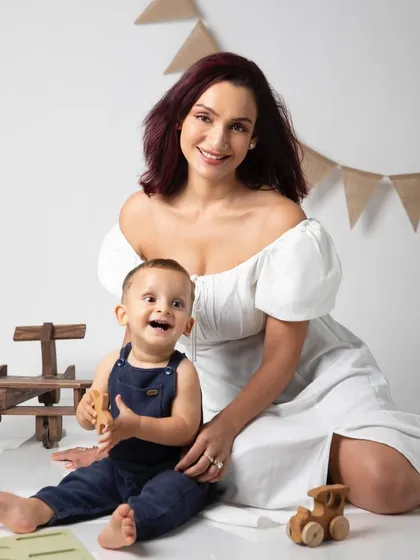 A beautiful moment between mother and son during his first birthday photoshoot. We always make time to include family in these milestone sessions.