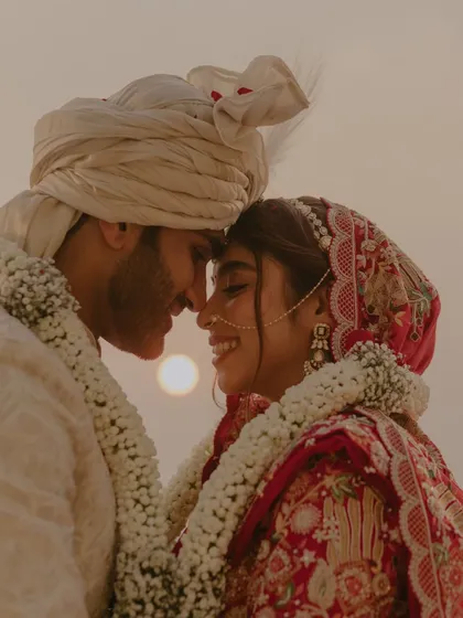As the sun sets, two worlds become one. We love using natural light to create timeless, romantic silhouettes like this one, capturing the pure essence of a couple's connection against a beautiful, warm sky.
