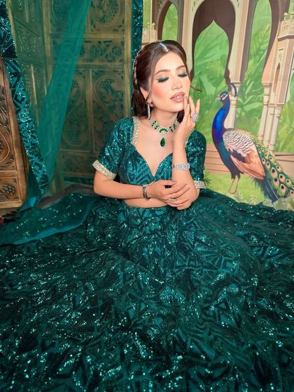 A dreamy, artistic shot. The makeup looks beautiful under different lighting, a testament to good technique.