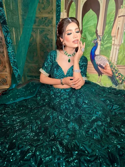 A dreamy, artistic shot. The makeup looks beautiful under different lighting, a testament to good technique.