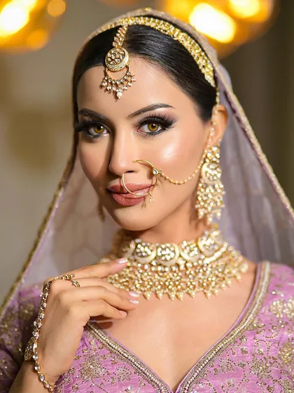 A final look at this stunning bride. The makeup is designed to be picture-perfect, with defined features that stand out beautifully.
