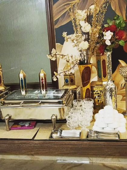 Even with limited space, our team creates a beautiful layout. This setup for 25 people uses the home's existing furniture for a seamless look.