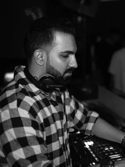The pictures might be monochromatic, but the night was anything but. Capturing the mood while spinning a set on a Saturday night.