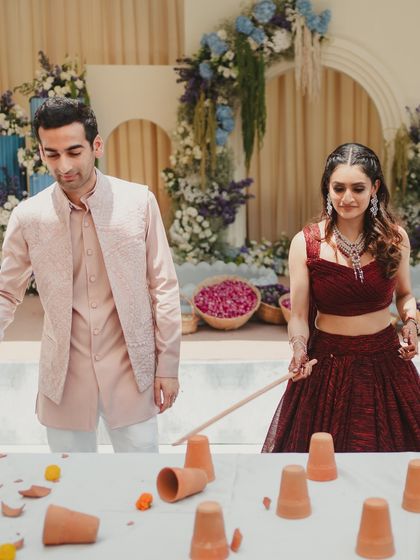 A little competition and a whole lot of love. We incorporated simple, traditional games into the Haldi ceremony, which turned into a memorable moment of playful banter for the couple.
