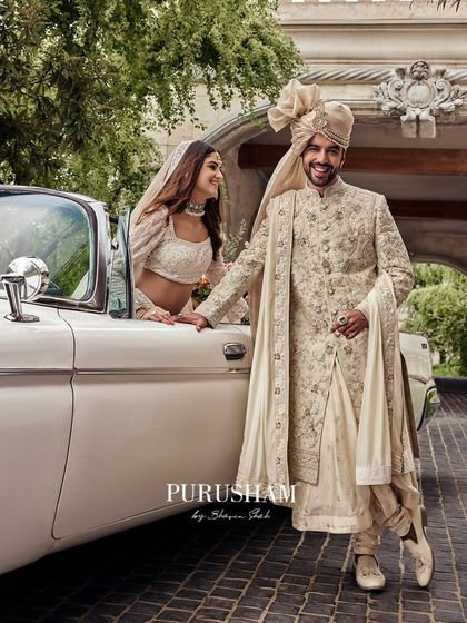 Another angle from this timeless 'Amore' shoot. The groom's smile reflects the joy of the day, his attire a testament to a love crafted to last forever.