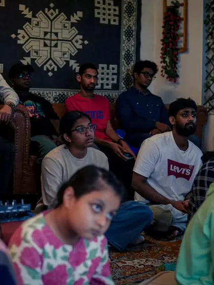 A different angle of the attendees, showing the diverse group of singers who came to learn.
