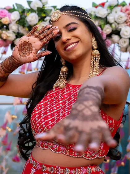 The bride showing off her beautiful henna design.