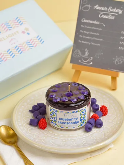 For a fruity indulgence, try my Blueberry Cheesecake candle. It's topped with realistic wax blueberries and has a rich, berry-licious fragrance.