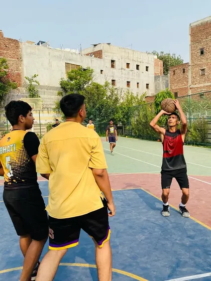 Perfect shooting form on display. We break down the mechanics of a good shot, from the feet to the follow-through, to build consistent shooters.