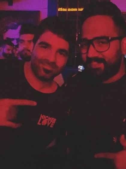 A photo with a fellow DJ. The electronic music scene is a community, and connecting with other artists who share the same passion is one of the best parts of the job.