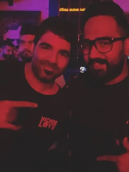 A photo with a fellow DJ. The electronic music scene is a community, and connecting with other artists who share the same passion is one of the best parts of the job.