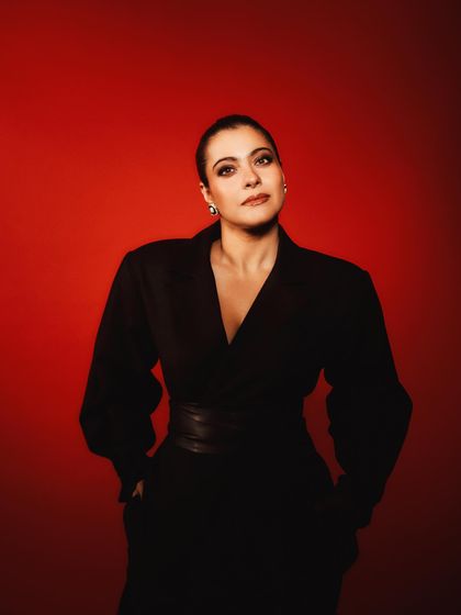 A confident, hands-in-pockets stance that exudes power and style.