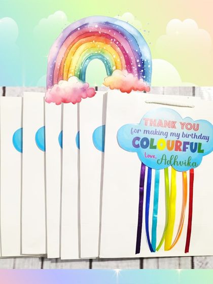 A closer look at the beautiful rainbow-themed paper bags, which feature a cloud-shaped thank you note and colorful ribbon streamers.