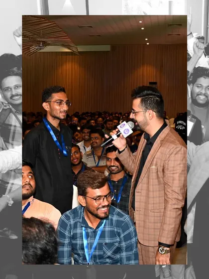 Interacting with an attendee at the HMS India Tour. Making a large conclave feel personal is one of my key skills.